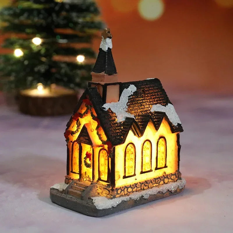 Casette di Natale in miniatura decorate con luci LED.