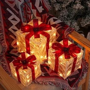 Tre set di scatole regalo decorative illuminate