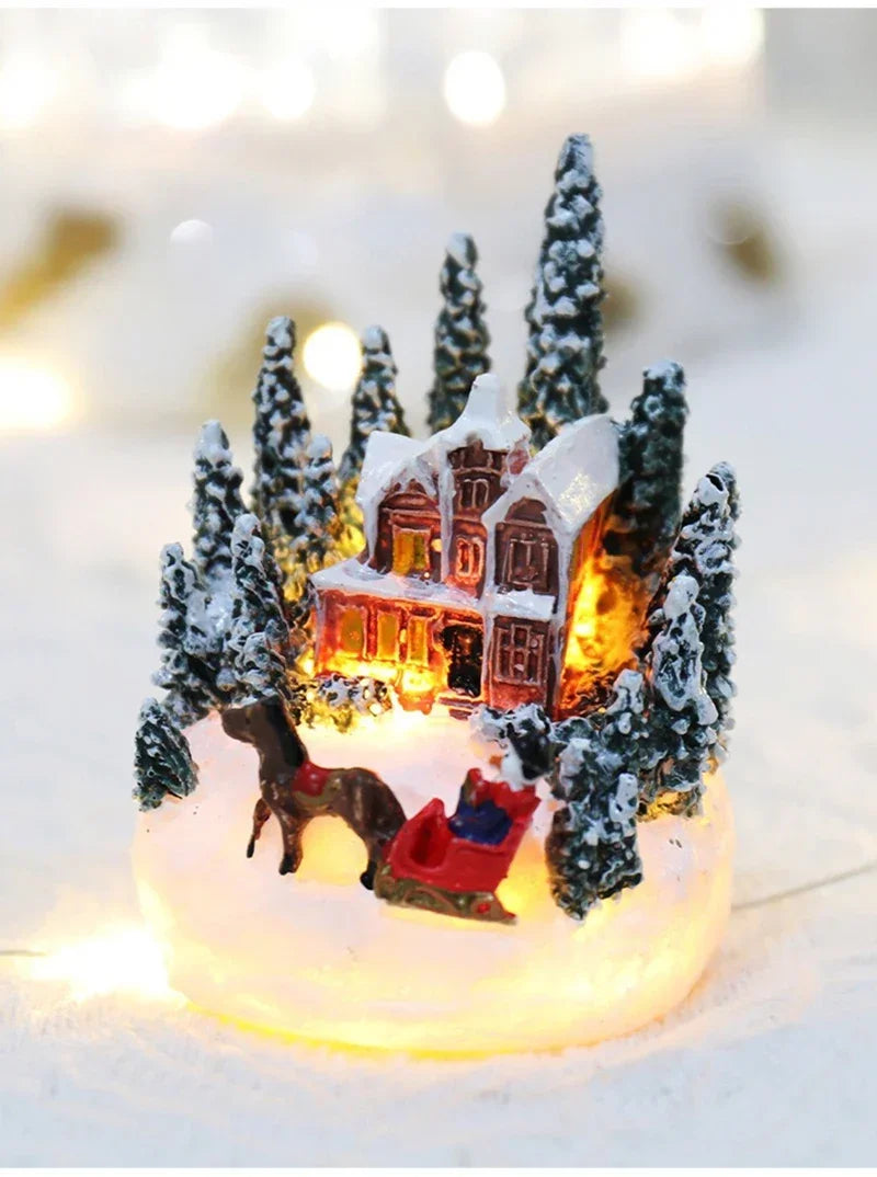Casette di Natale in miniatura decorate con luci LED.