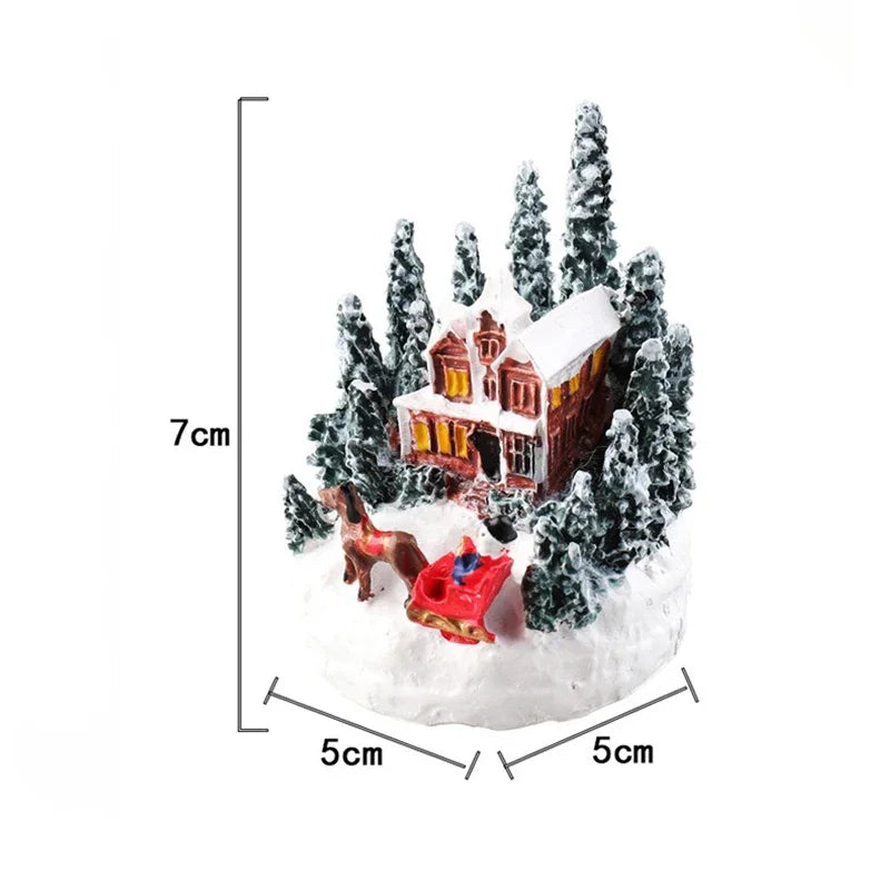 Casette di Natale in miniatura decorate con luci LED.