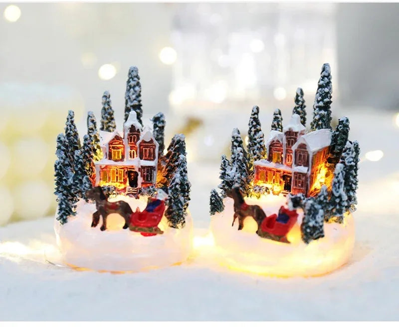 Casette di Natale in miniatura decorate con luci LED.